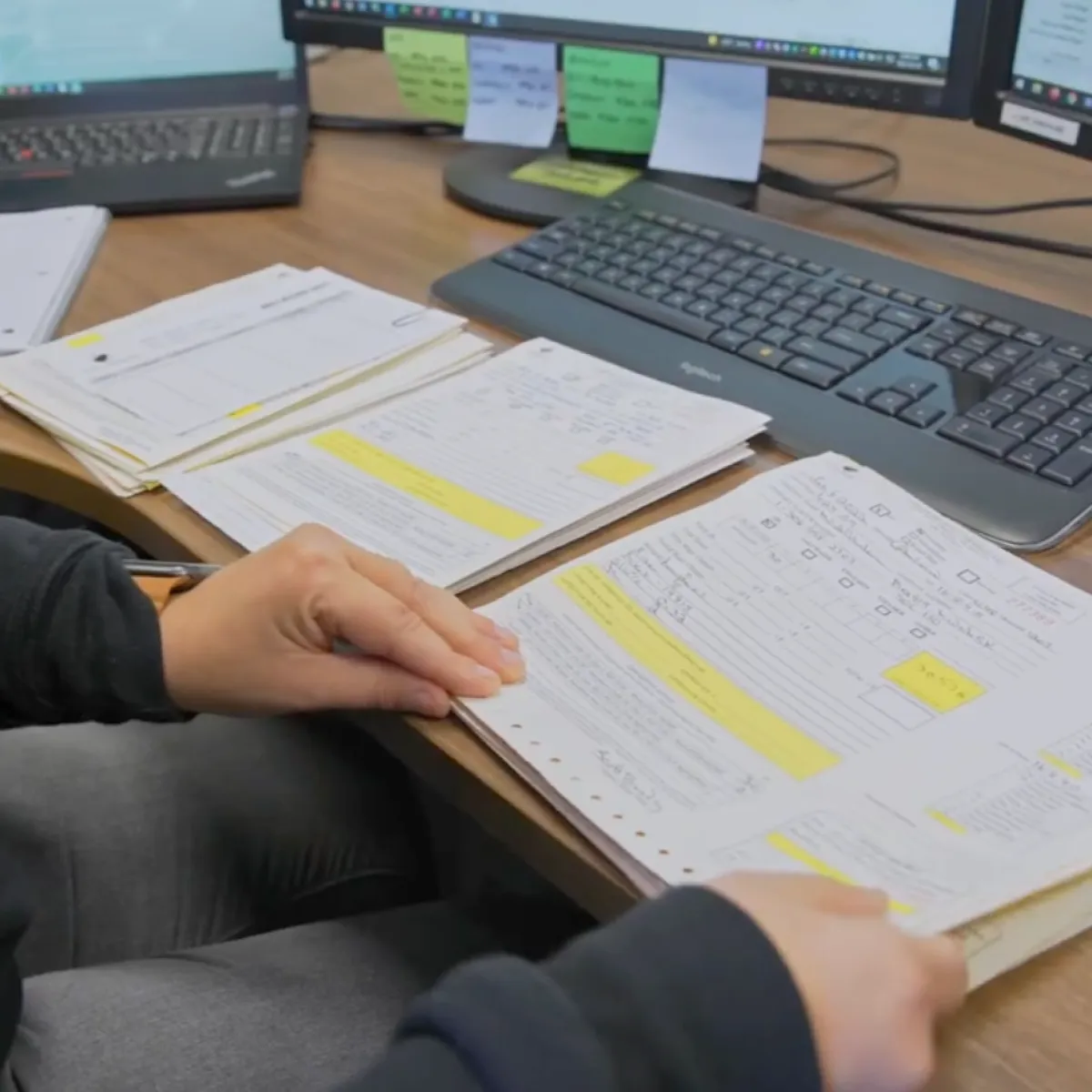 An Oilfield Administrator trying to enter messy paper tickets into a digital system