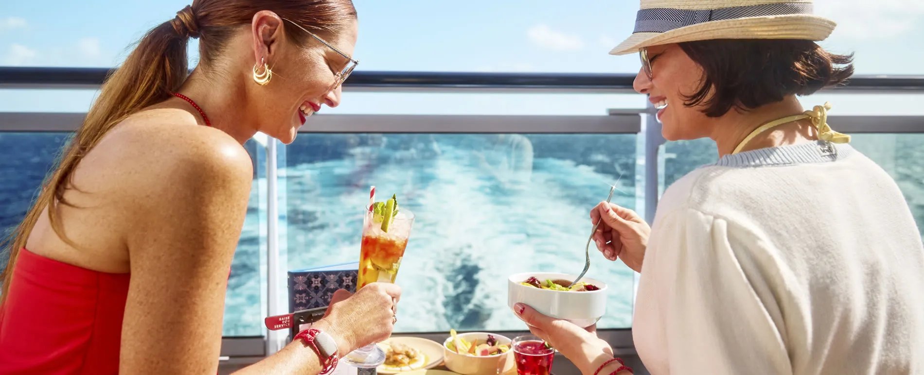 Virgin Voyages girlfriends dining with view