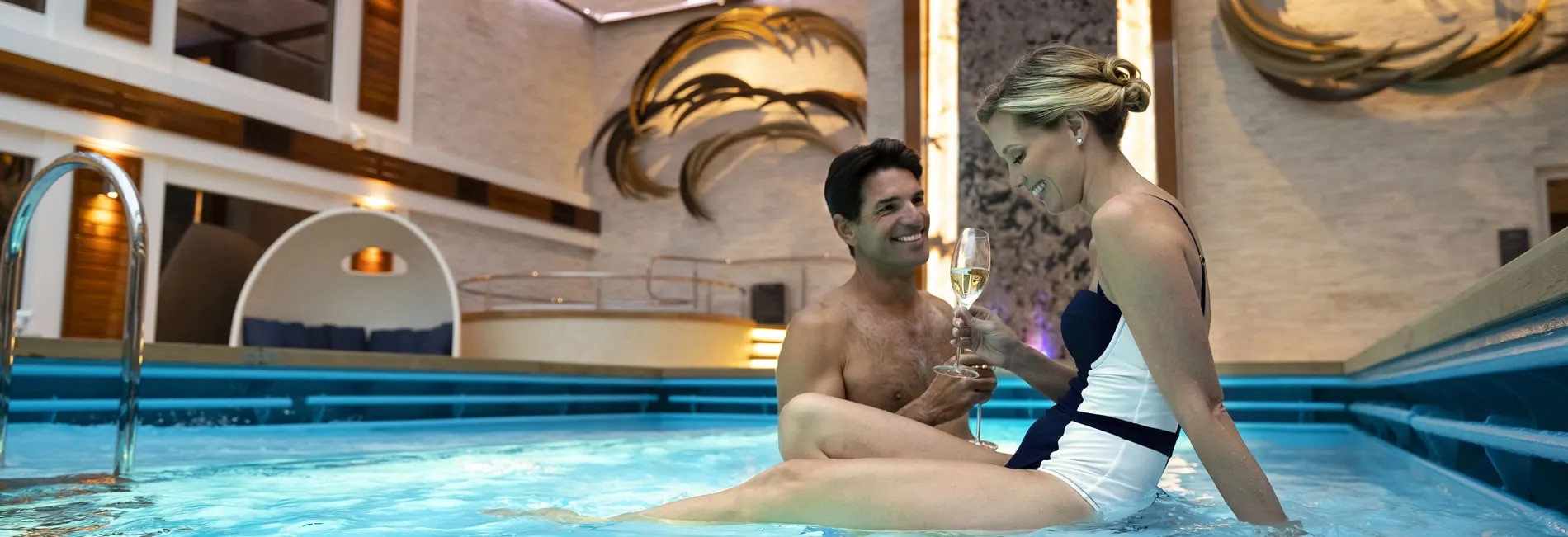 NCL Cruise Line Haven pool couple