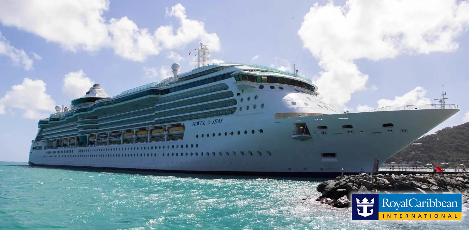 Royal Caribbean Jewel of the Seas cruise ship docked at tropical port