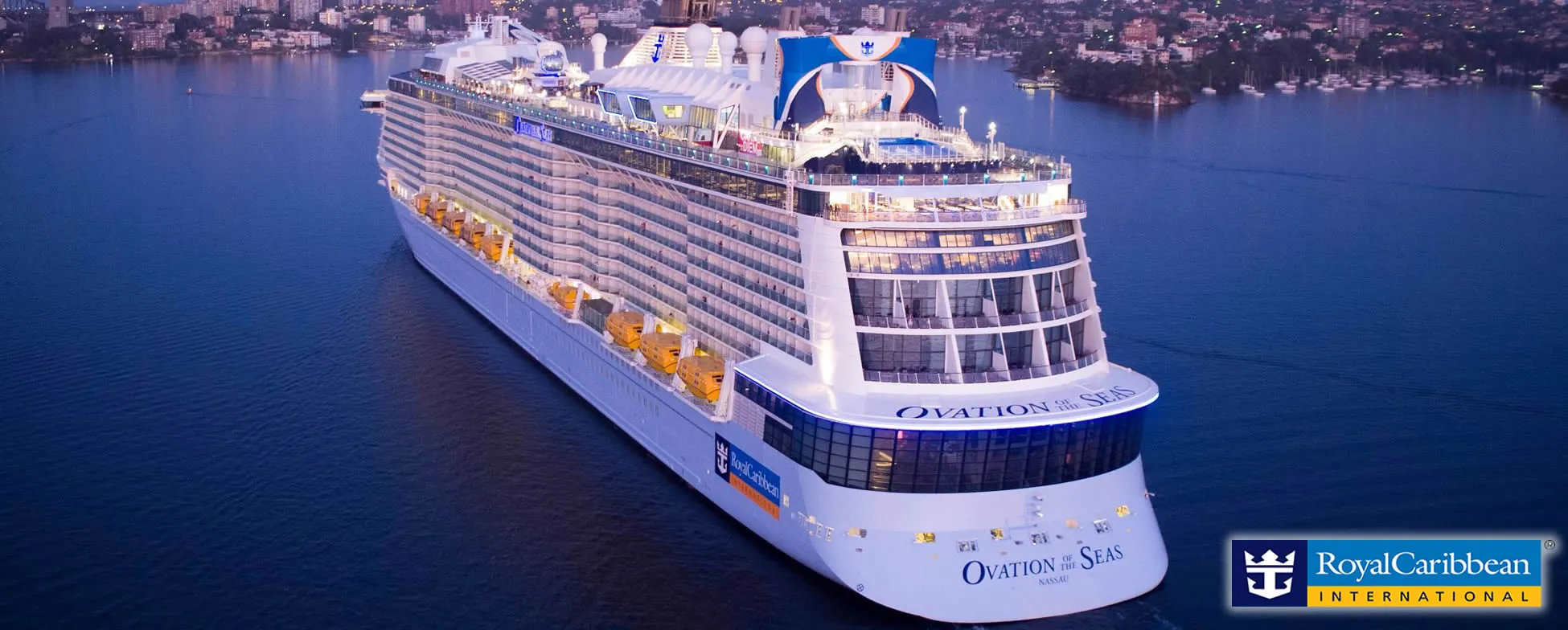 Royal Caribbean Ovation of the Seas cruise ship in harbor at night