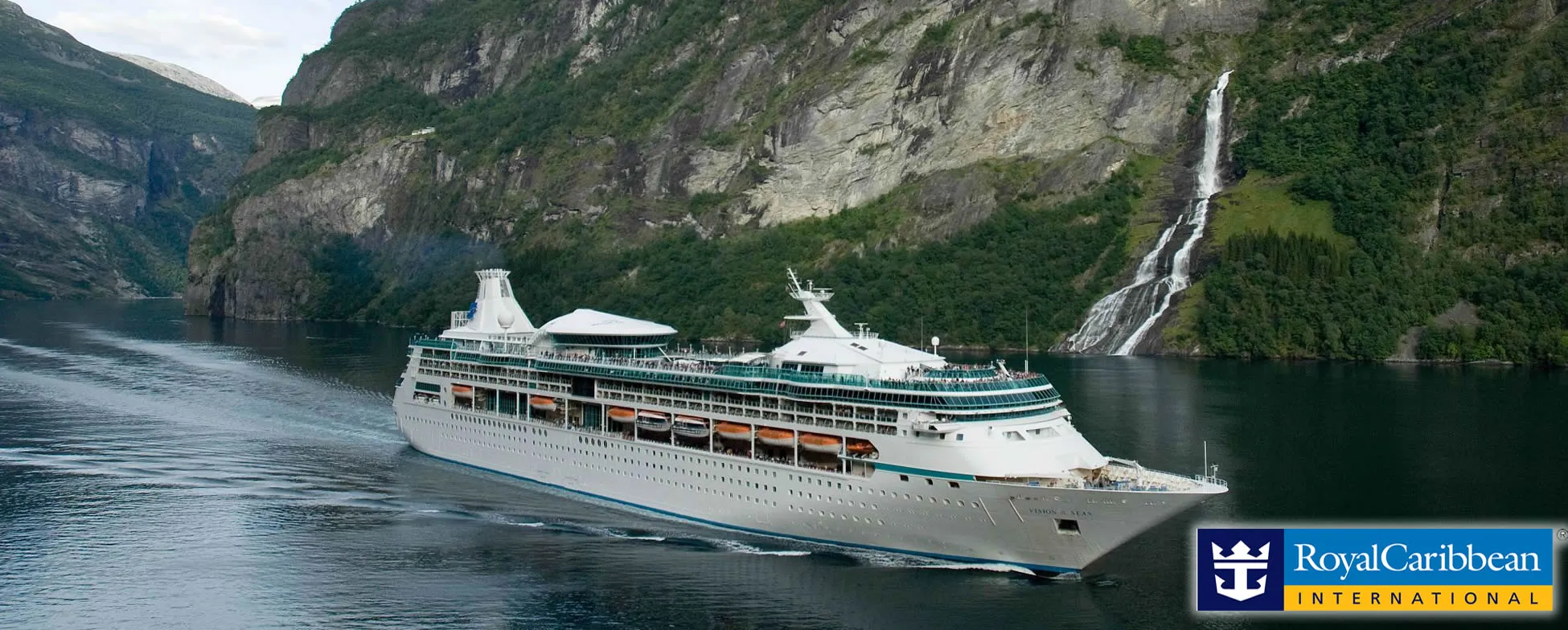 Cruise ship sailing through scenic Norwegian fjord with waterfall