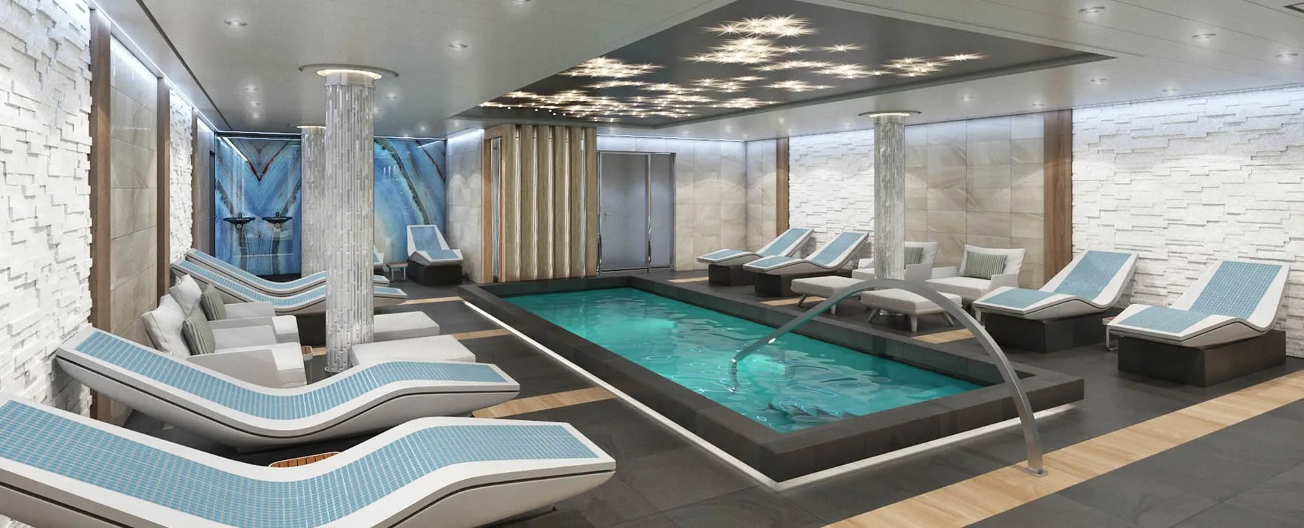 Modern indoor spa with blue pool, lounge chairs, and decorative lighting