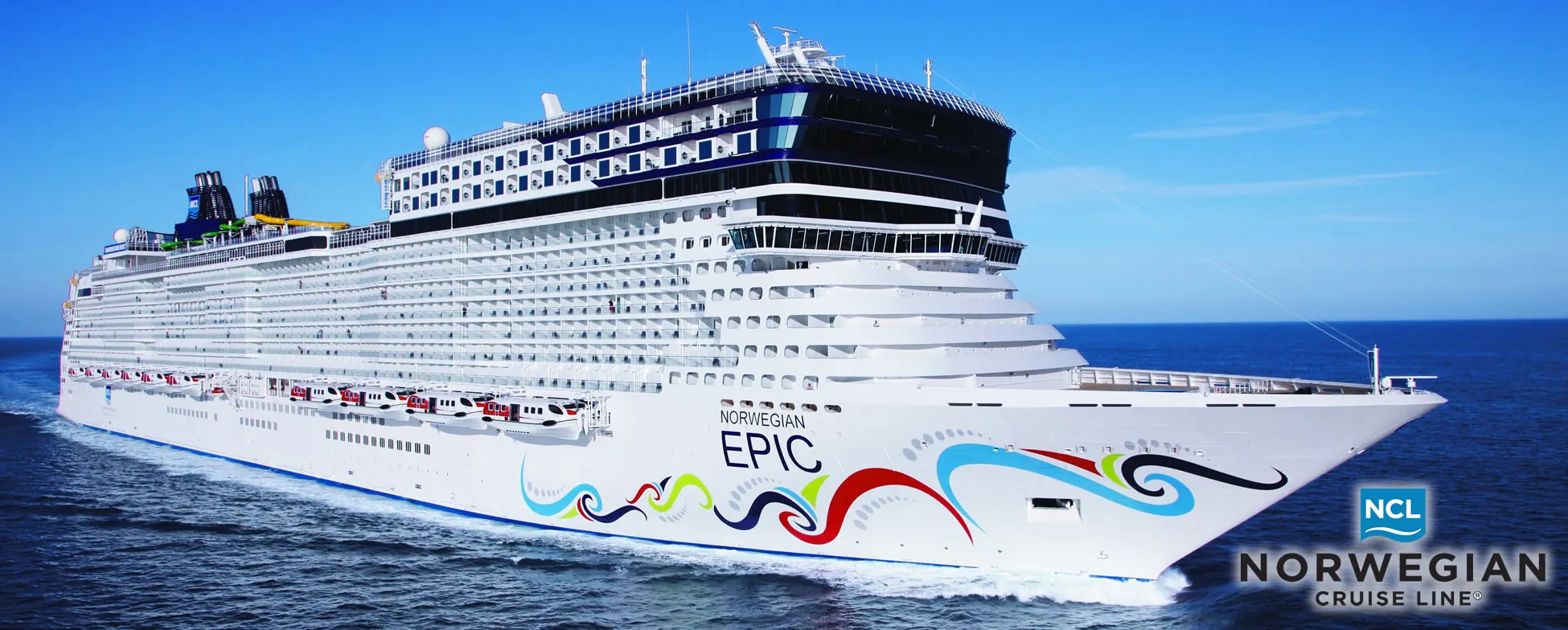 Norwegian Epic cruise ship sailing on blue ocean with colorful waves