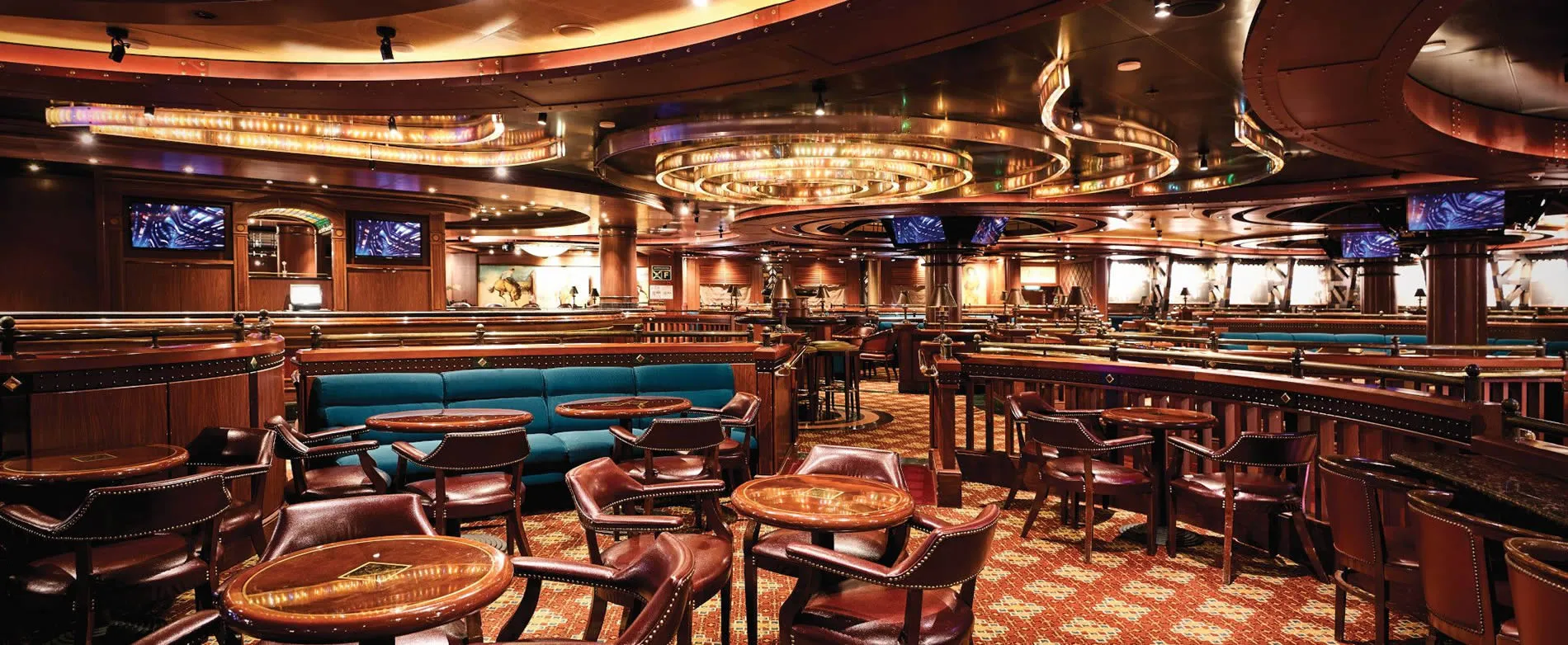 Luxurious cruise ship lounge with ornate chandeliers and leather seating