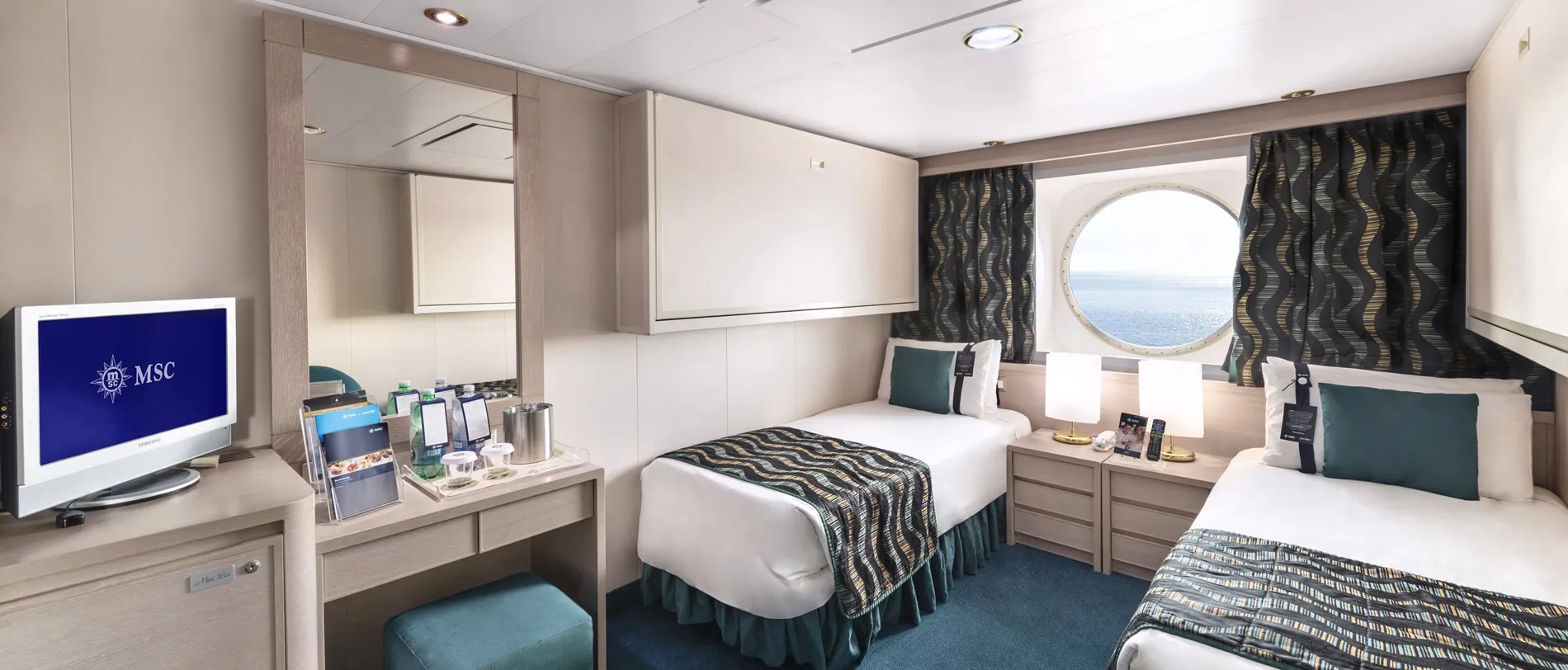 MSC cruise ship cabin with two beds, ocean view, and modern amenities