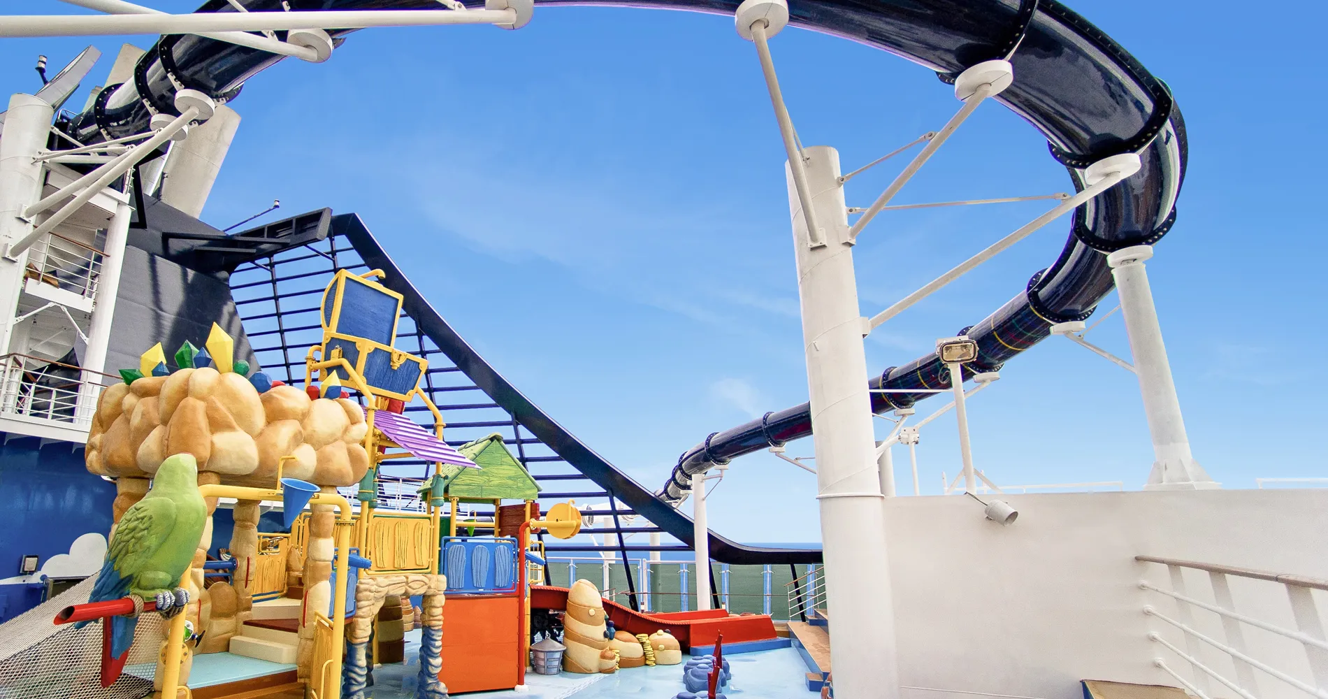 Colorful water park slide and playground on a cruise ship deck