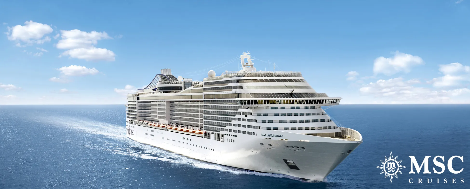 Large white MSC cruise ship sailing on blue ocean under cloudy sky