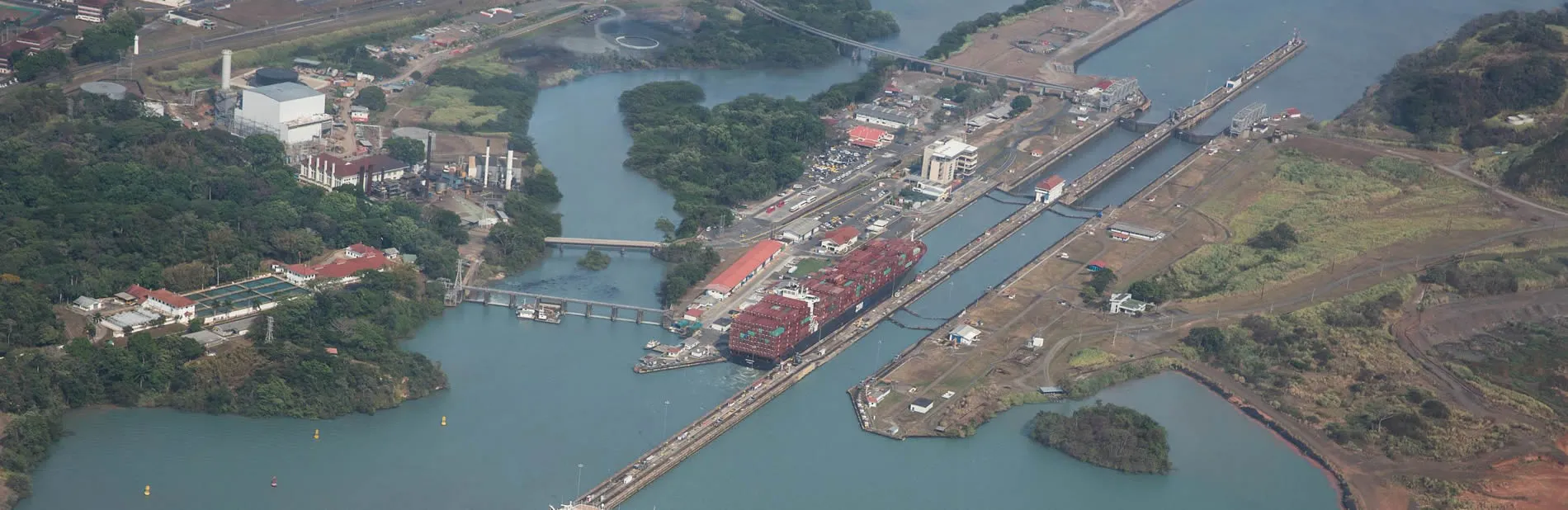 Aerial view of Panama Canal with ships passing through lock system