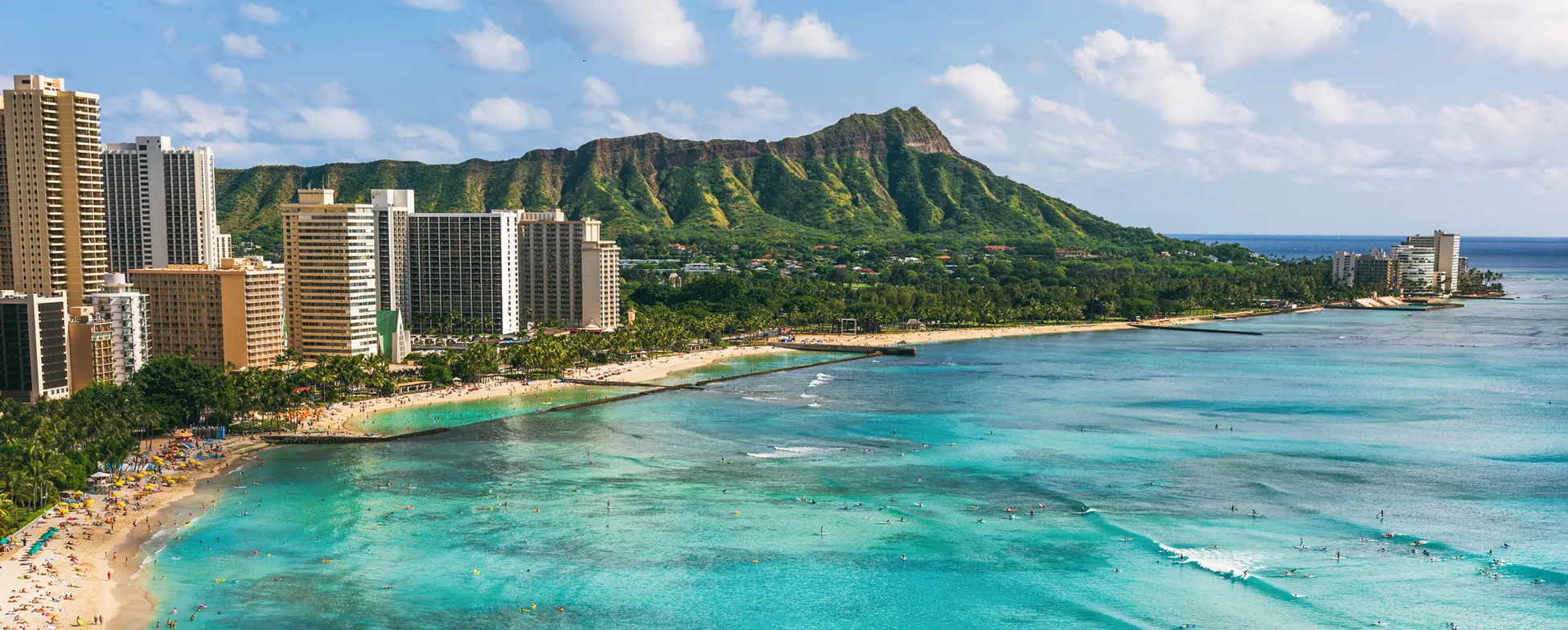 Waikiki Beach, Honolulu with Diamond Head volcano in background