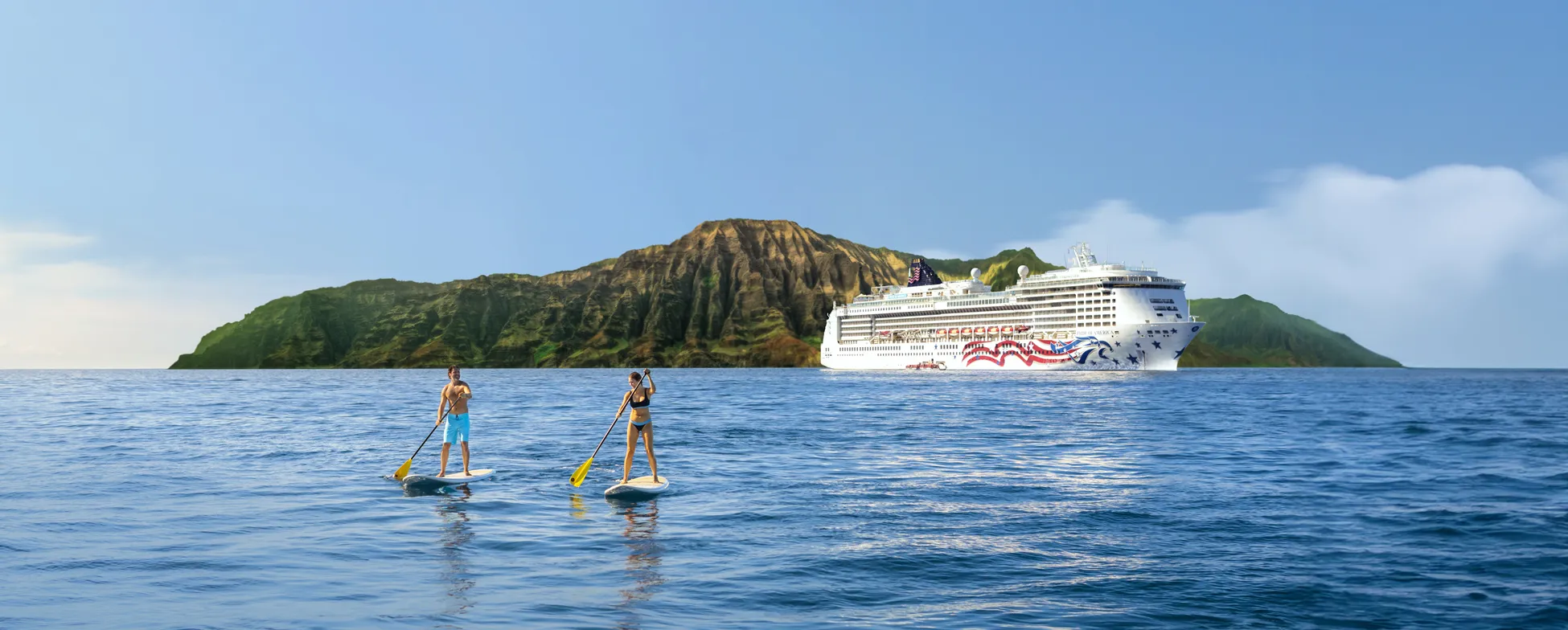 Two paddleboarders near cruise ship with mountainous Hawaiian island backdrop