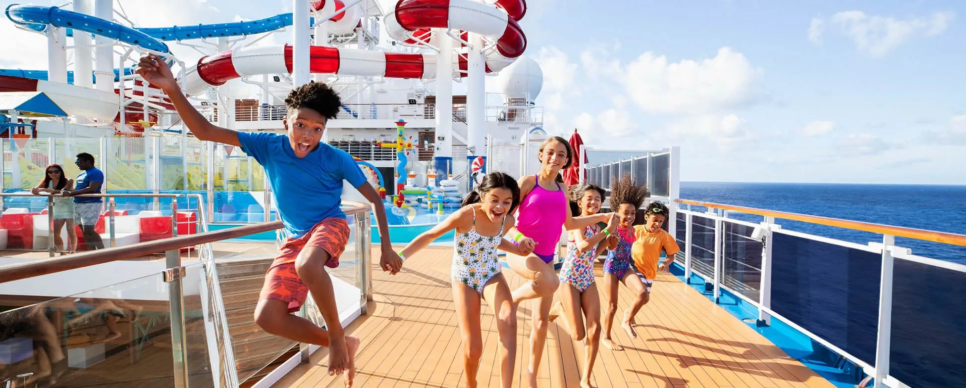 Children having fun on a cruise ship water park deck