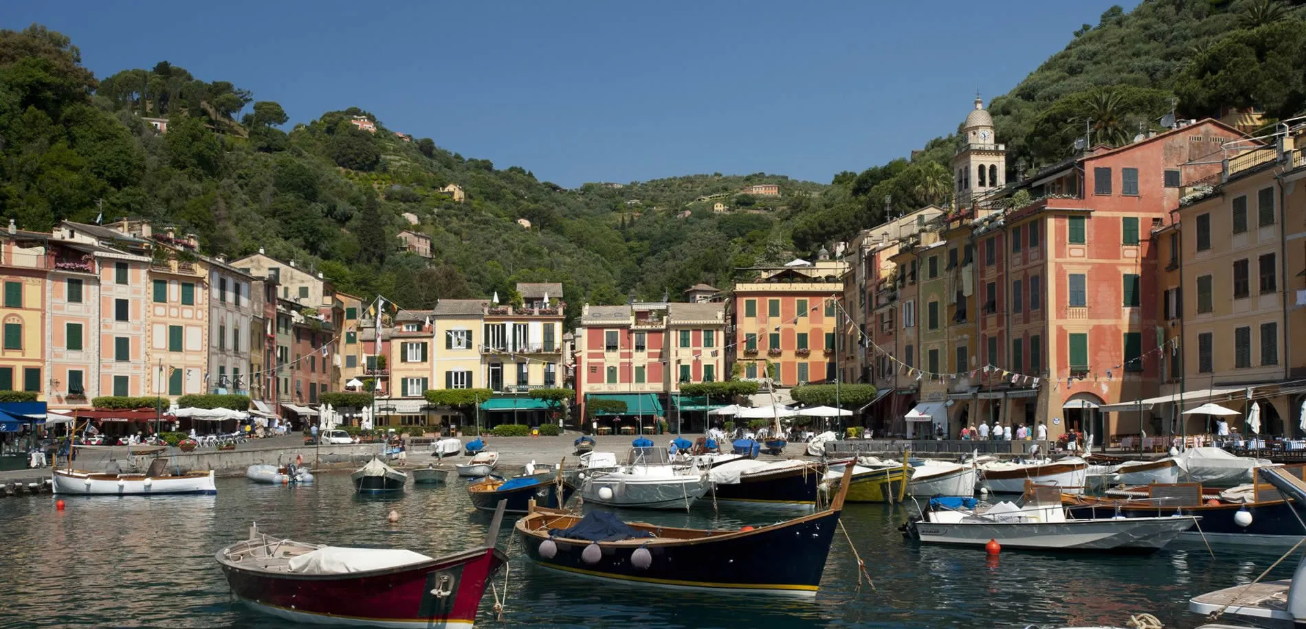 Colorful boats in picturesque harbor of Portofino, Italian Riviera
