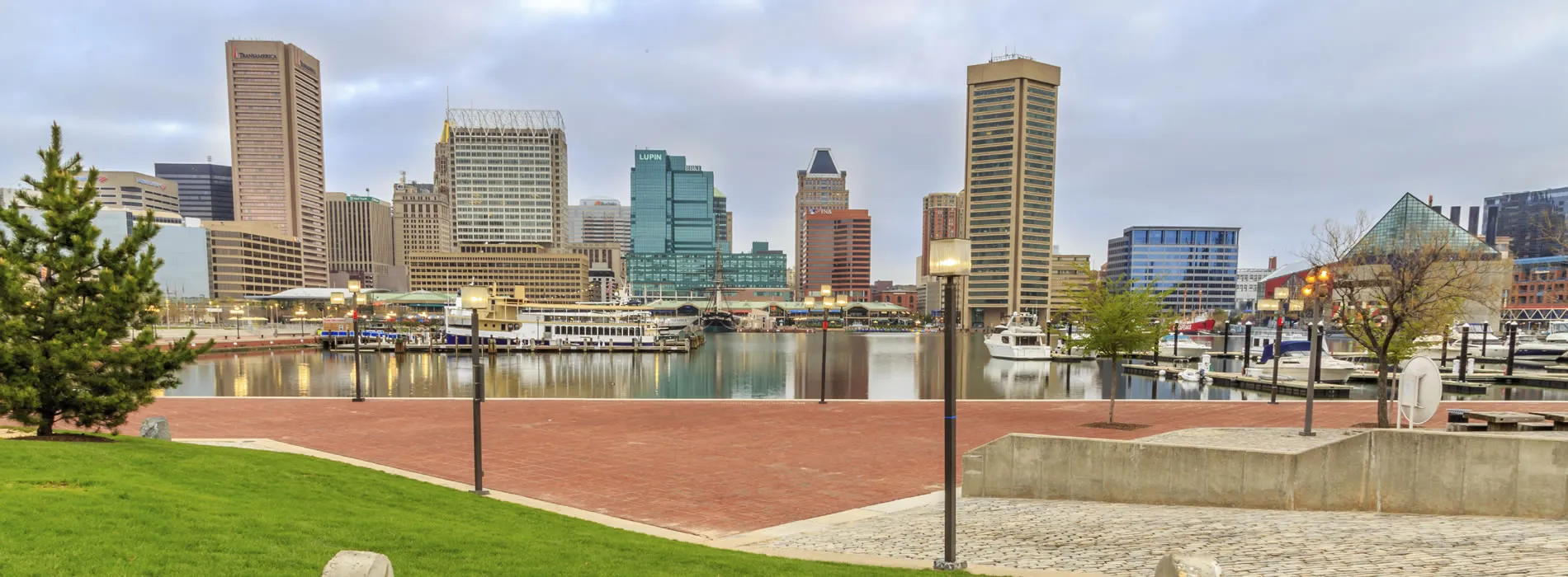 Baltimore Inner Harbor skyline with marina, skyscrapers, and waterfront park