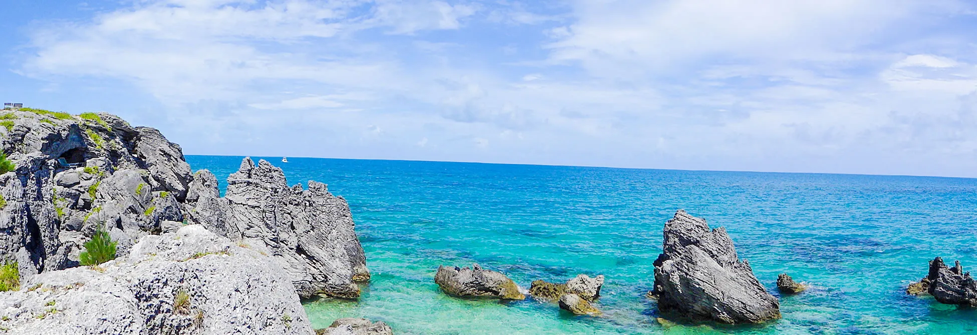 Rocky coastal landscape with turquoise waters and dramatic stone formations