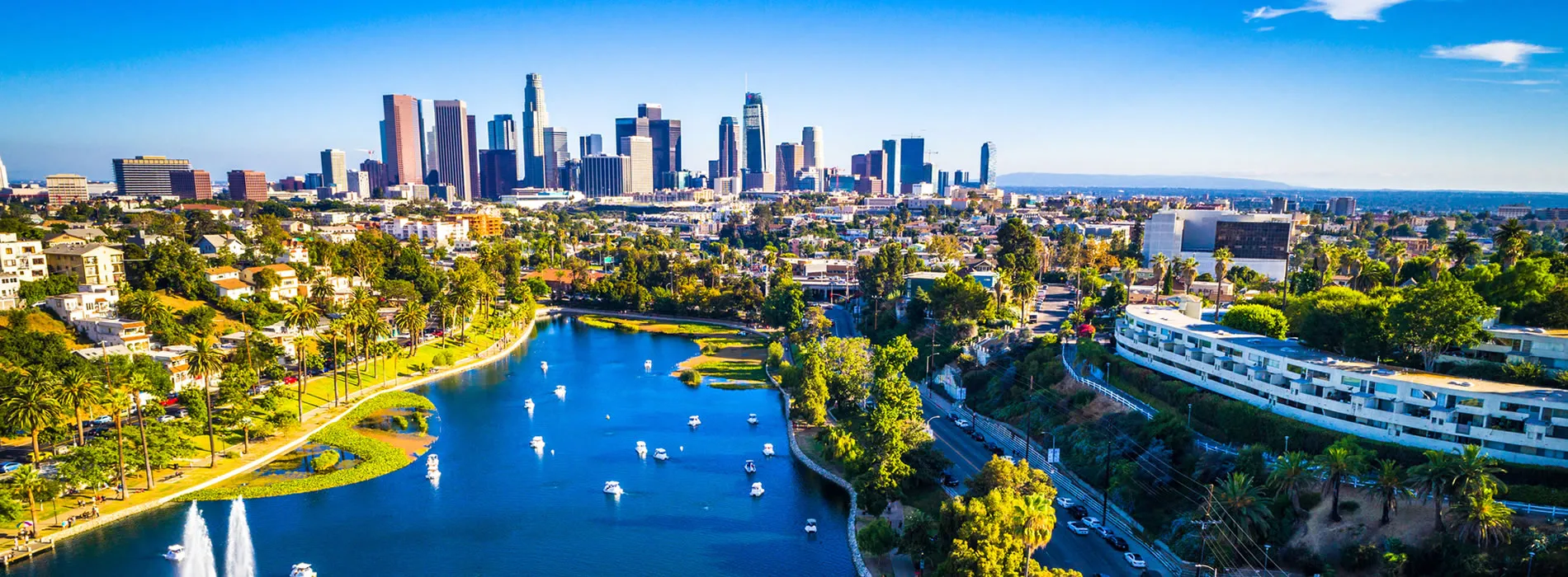 Los Angeles skyline with downtown skyscrapers and scenic Echo Park lake