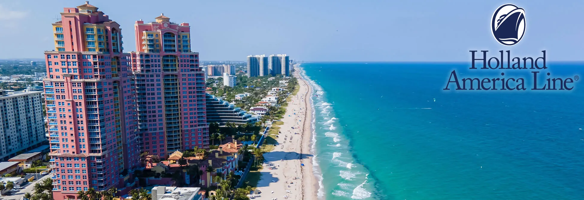 Colorful beachfront condos along turquoise waters of Florida coastline