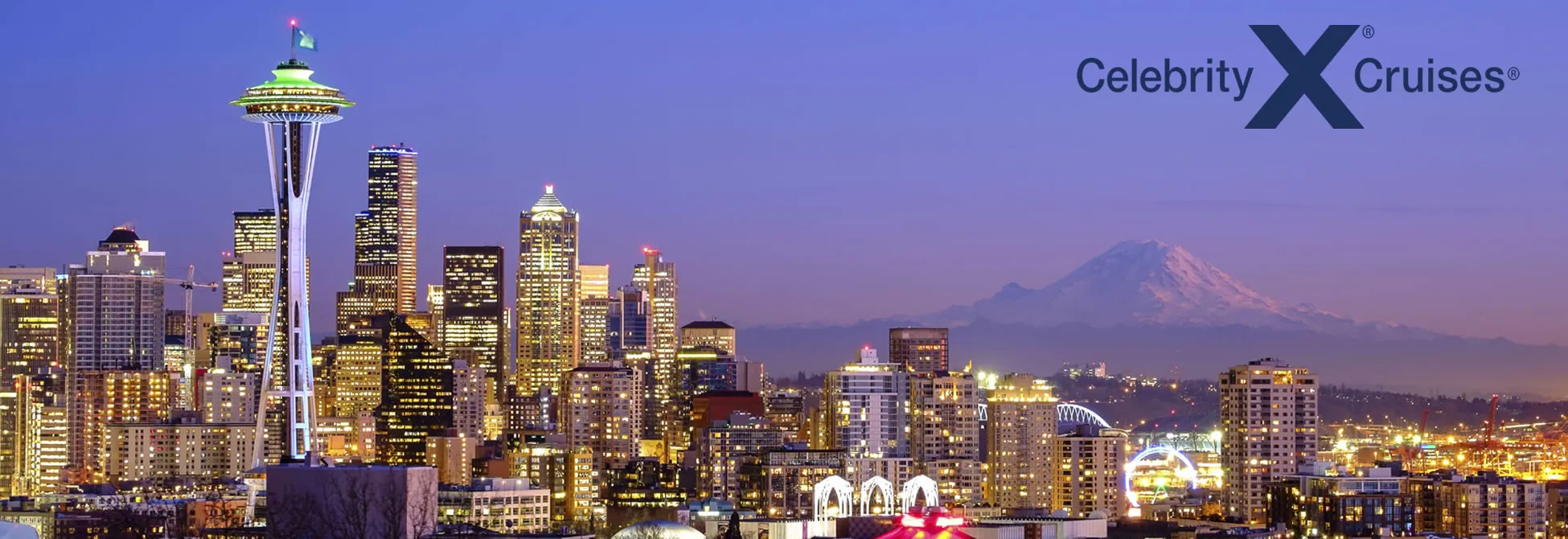 Seattle skyline at night with Space Needle and Mount Rainier