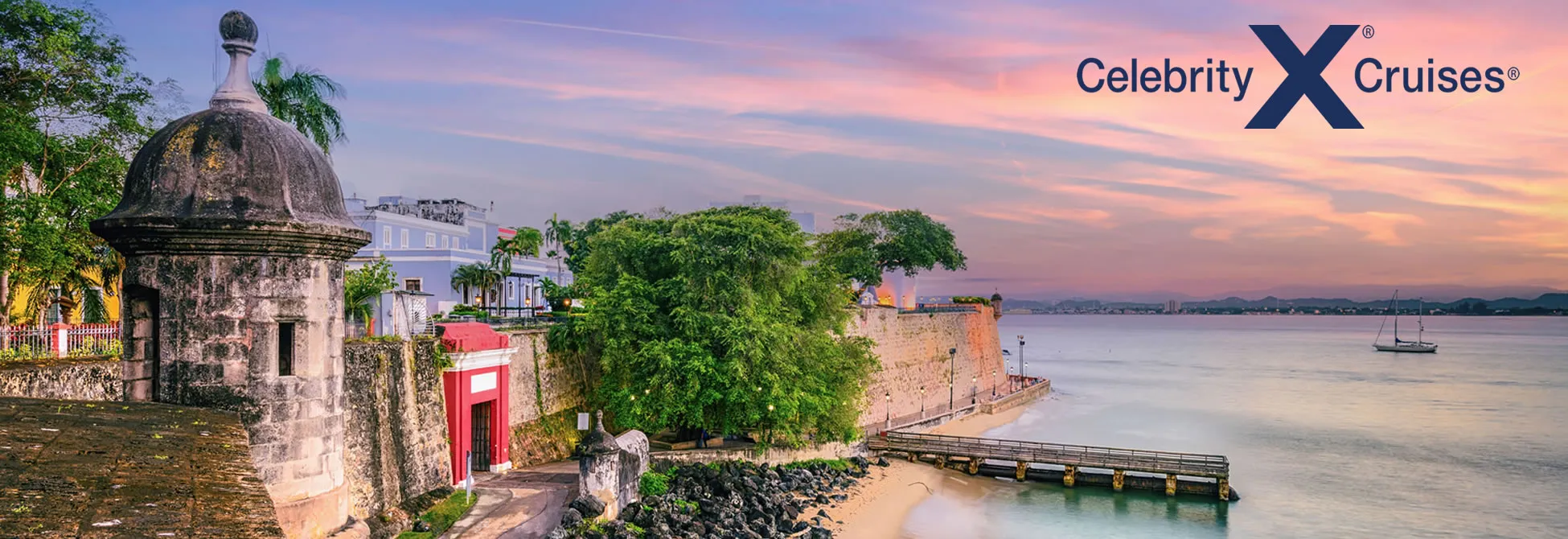 Old San Juan fortress wall with colorful sunset over Caribbean harbor