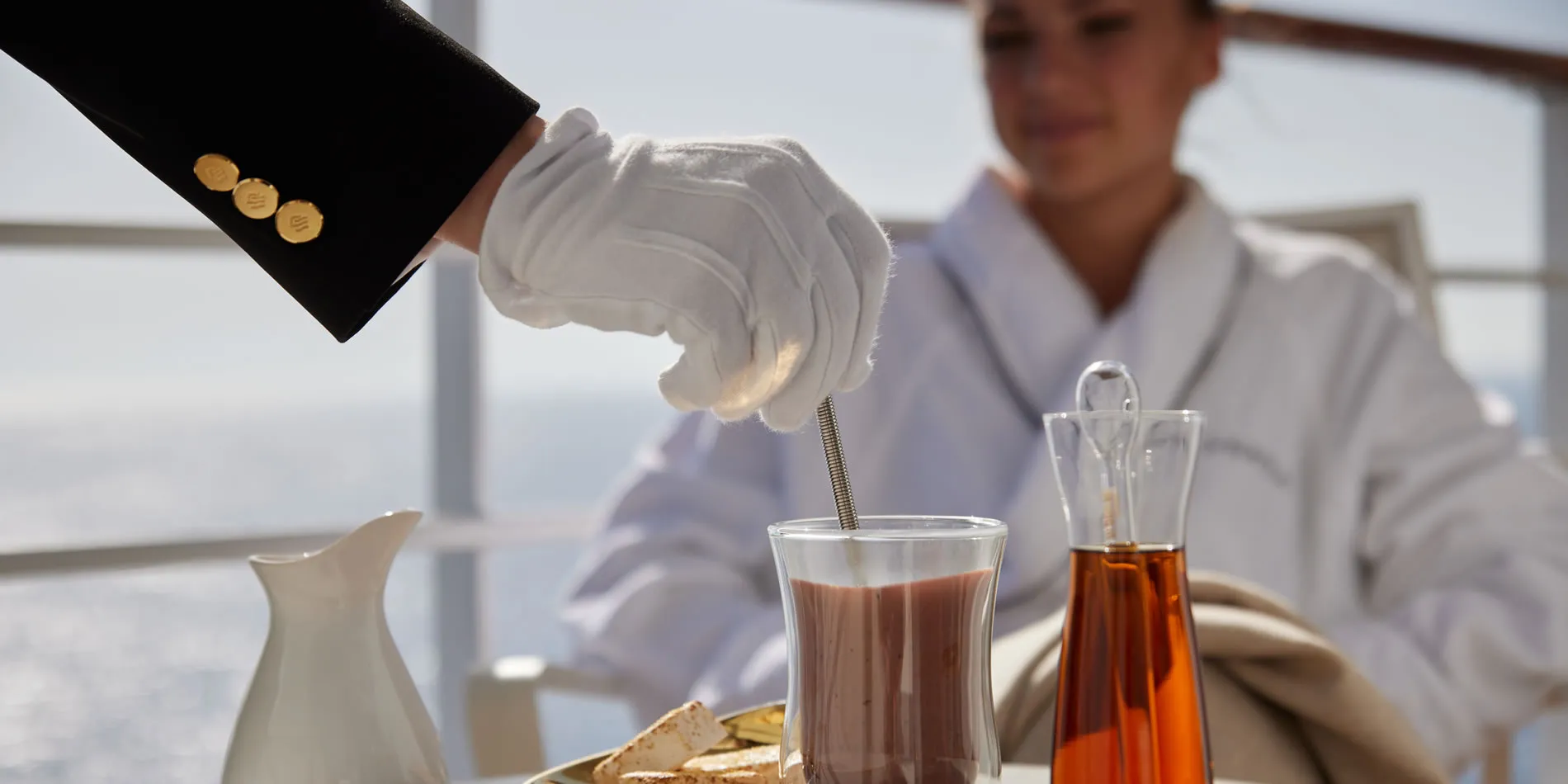 Scientist in white coat preparing experiment with glassware and liquid