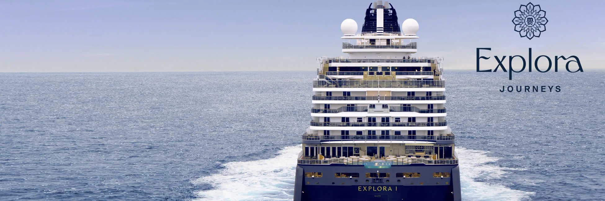 Explora Journeys cruise ship sailing on calm blue ocean waters