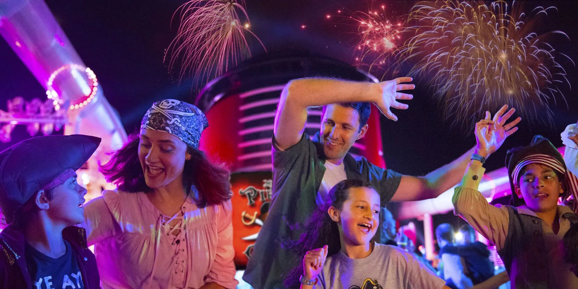 Excited crowd enjoying fireworks and celebration with colorful lights