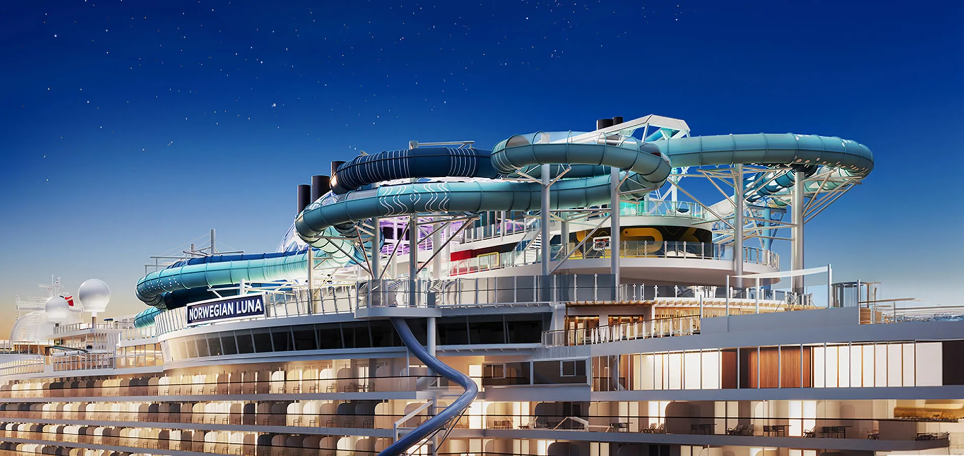 Norwegian Luna cruise ship with water slides against starry night sky