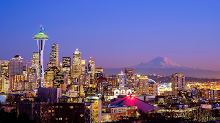 Seattle skyline at dusk with Space Needle, downtown, and Mount Rainier