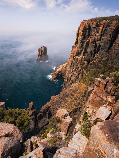 Explore the stunning coastal cliffs of Tasmania, showcasing rugged beauty and breathtaking ocean views.