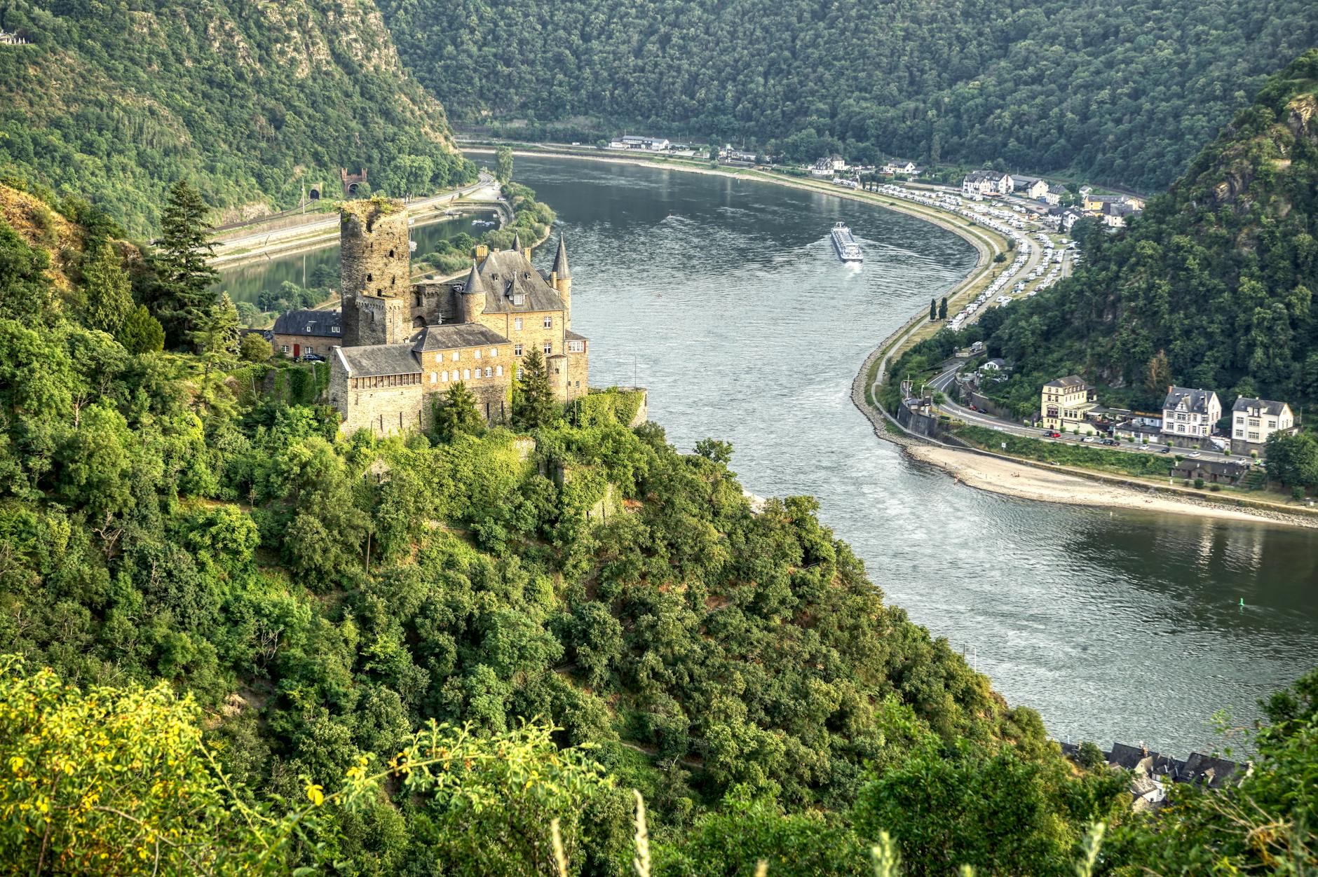 Katz Castle perched on a hillside overlooking the winding Rhine River near Sankt Goarshausen, Germany — a iconic landmark along Basel cruise routes through the Rhine Valley.