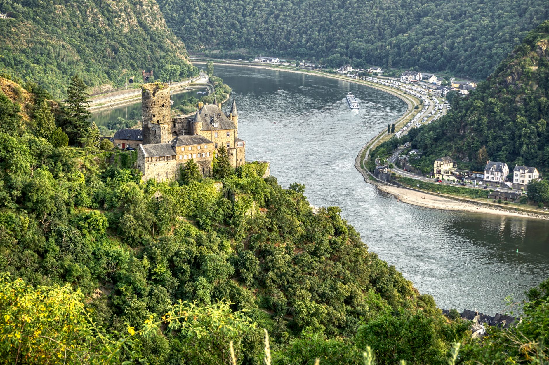 Katz Castle perched on a hillside overlooking the winding Rhine River near Sankt Goarshausen, Germany — a iconic landmark along Basel cruise routes through the Rhine Valley.