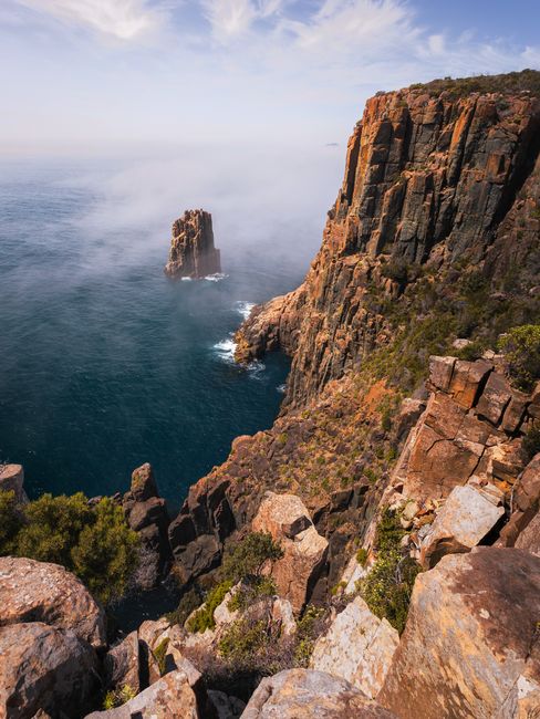 Explore the stunning coastal cliffs of Tasmania, showcasing rugged beauty and breathtaking ocean views.