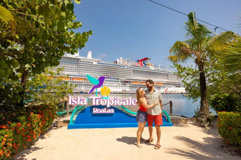 Cruise ships docked at the Isla Tropicale terminal in Dixon Cove