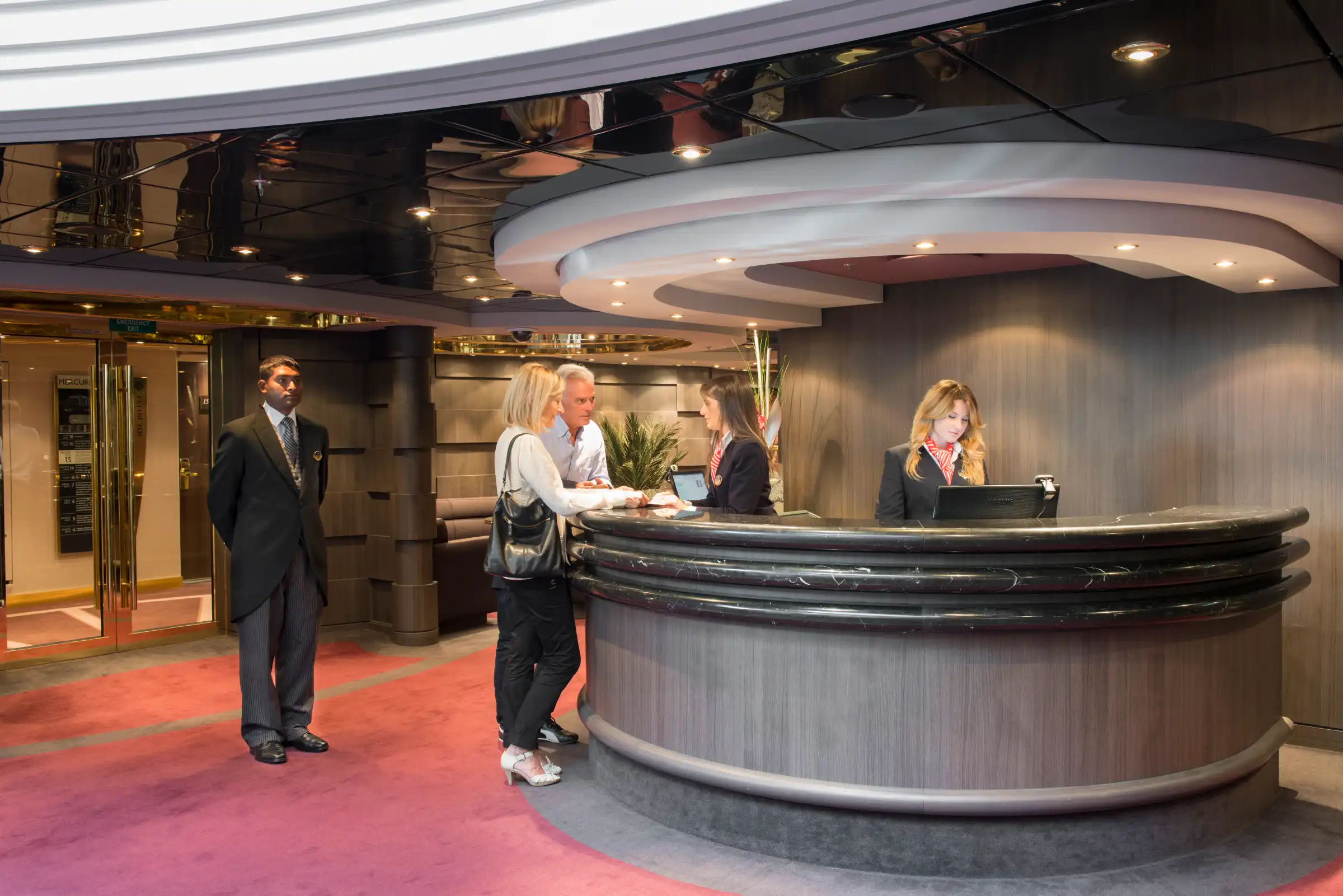 The private Yacht Club reception and concierge area