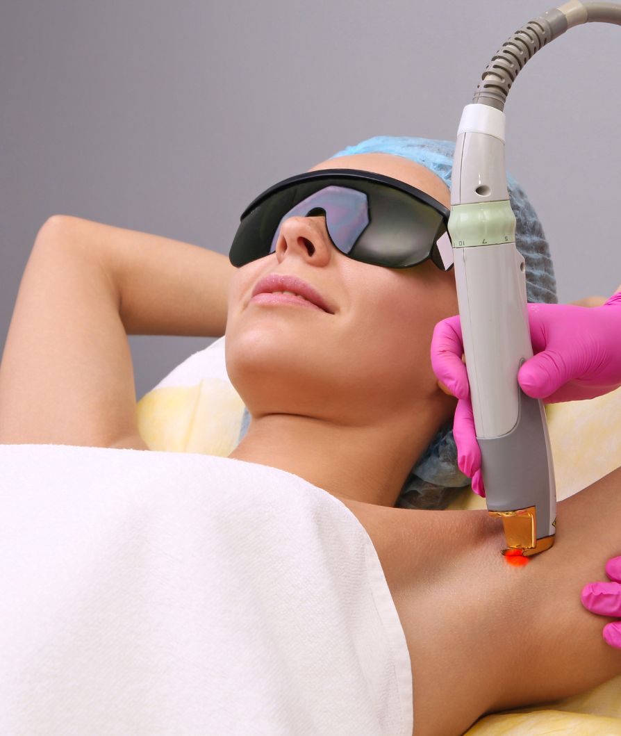 A young lady having a laser hair removal treatment