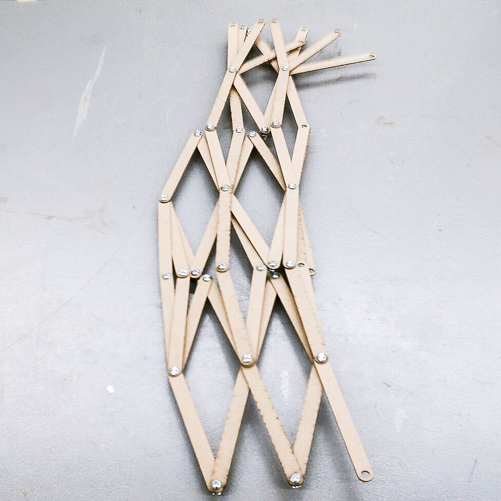 Early prototype using chipboard and simple screws. Minimized version.