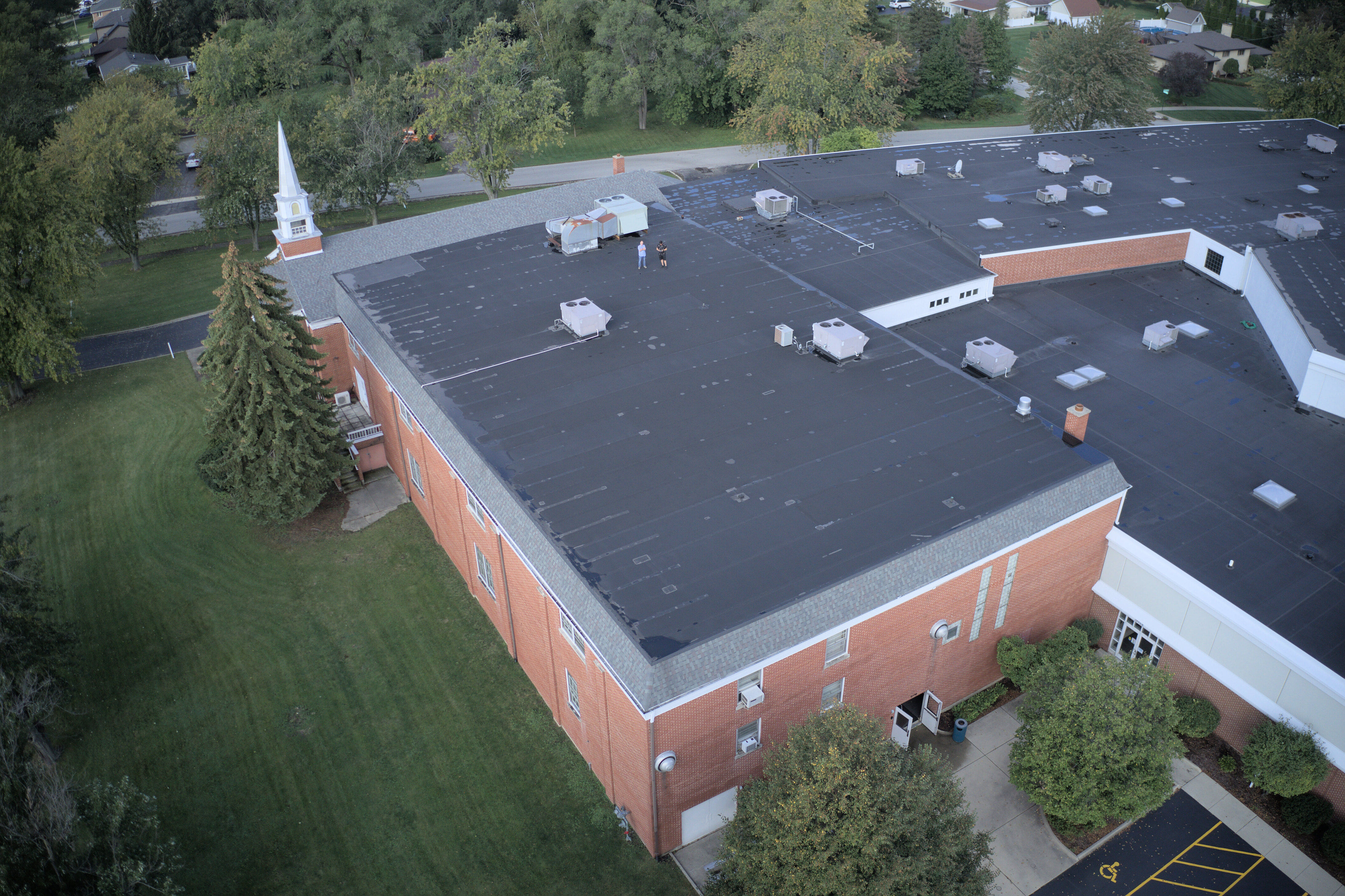 Aerial drone view large commercial TPO roofing project Illinois