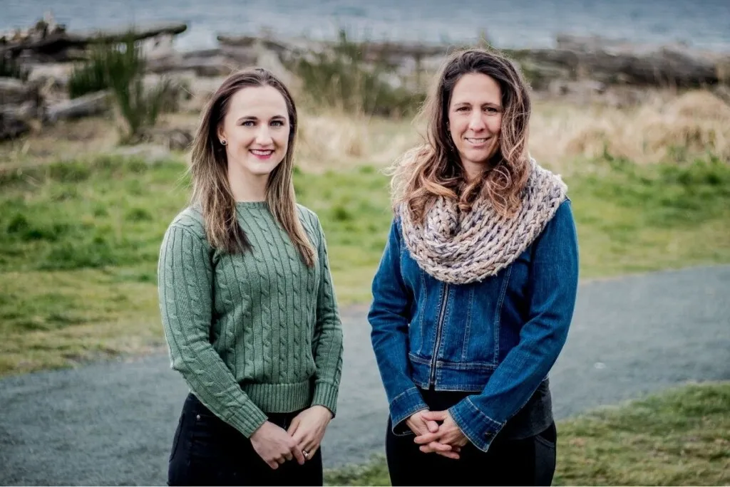Two women smiling outdoors