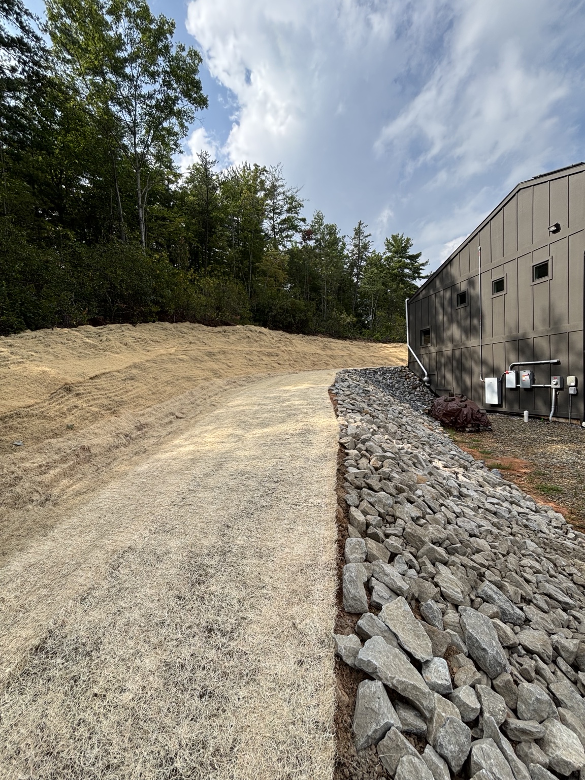 Finished stabilized bank beside the Ferguson mountain home