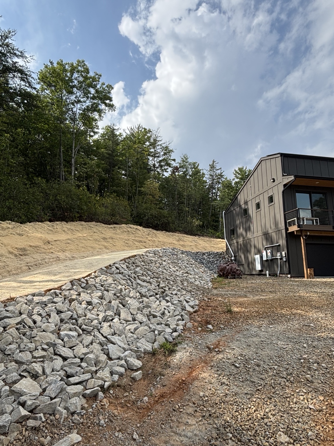 Finished riprap stabilization and graded terrace in Ferguson