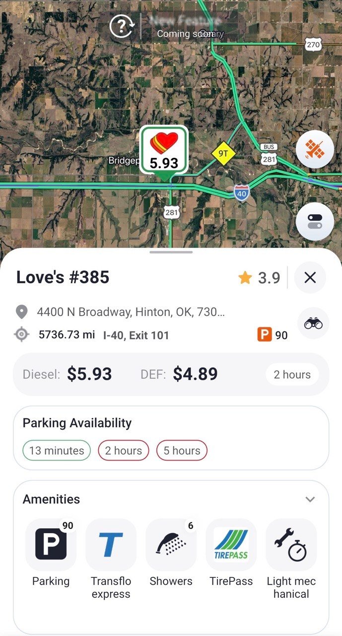 Trucker Guide app displaying a truck stop location with real-time parking availability.