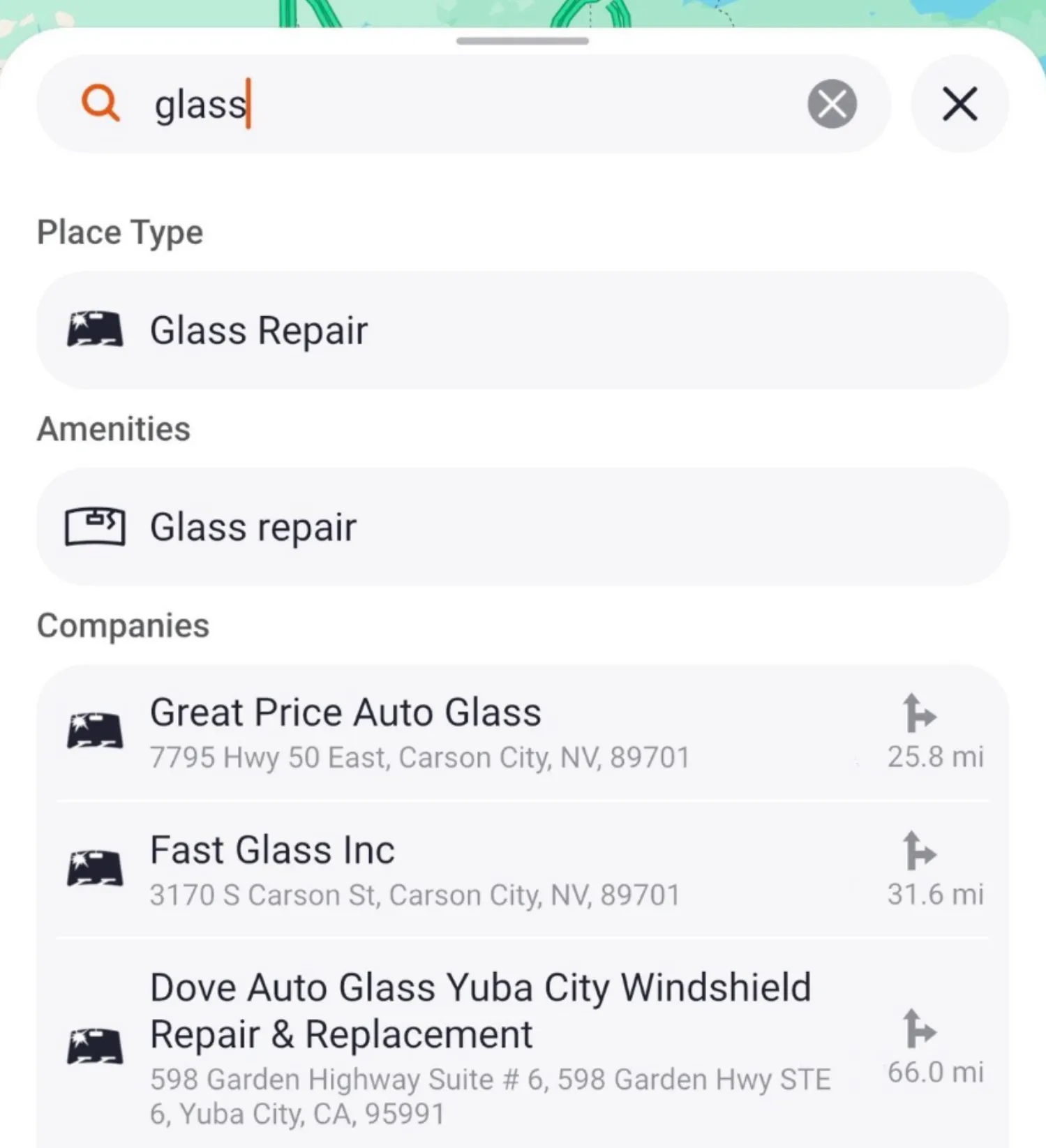 Trucker Guide showing relevant windshield repair search suggestions and matching service locations on the map.