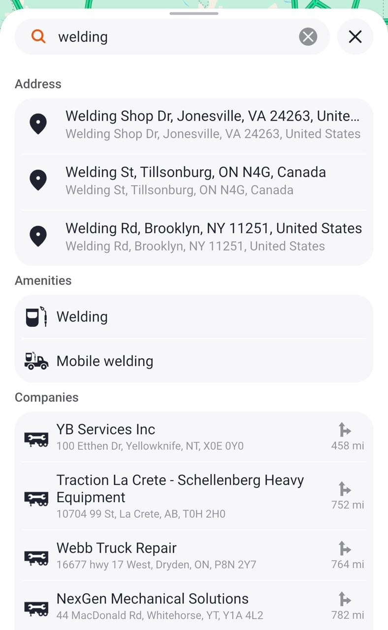 Trucker Guide app showing expanded search results for businesses and delivery destinations by name or address