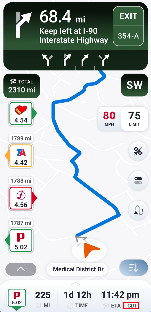 Trucker Guide navigation screen showing the estimated arrival time with a time zone indicator