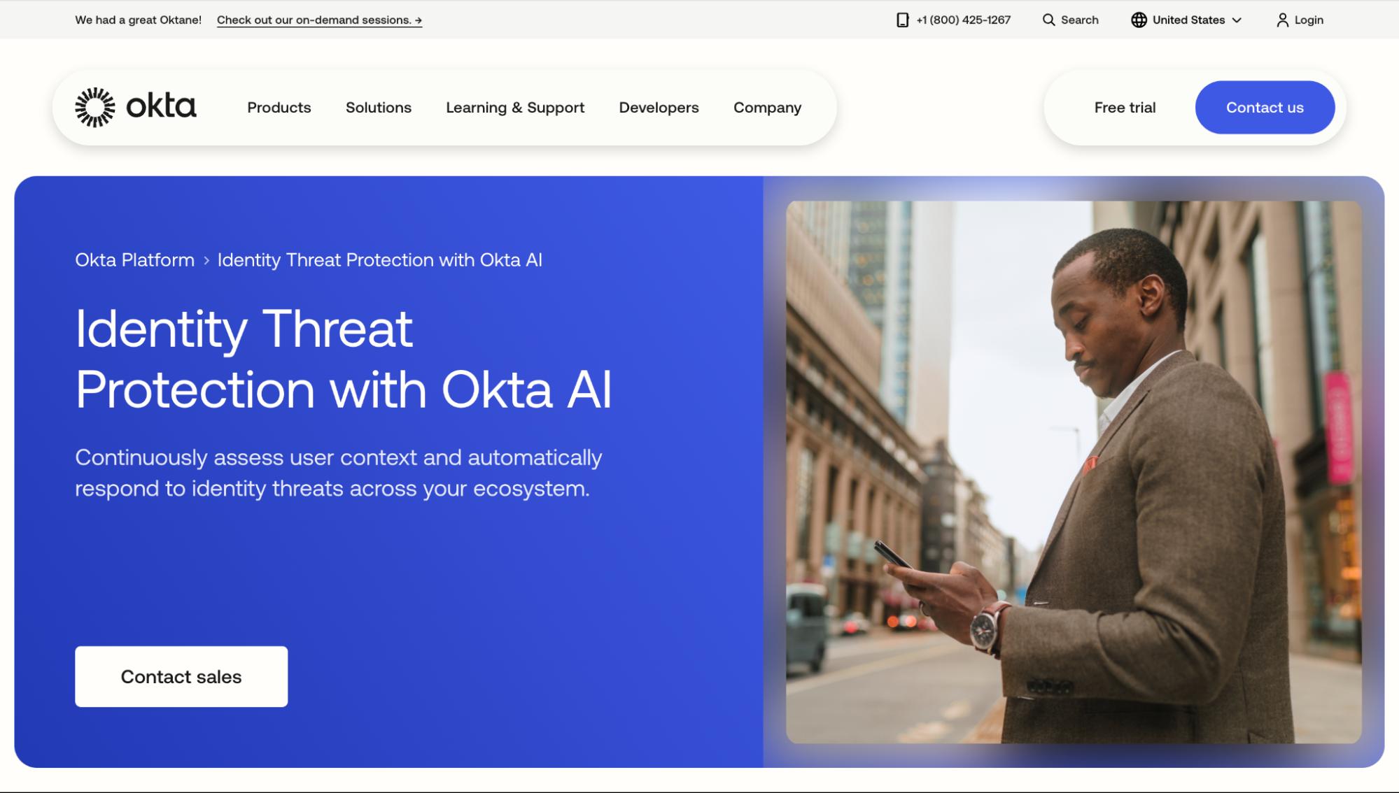 Okta webpage promoting Identity Threat Protection with Okta AI, offering continuous threat assessment, automated response, and sales contact options.