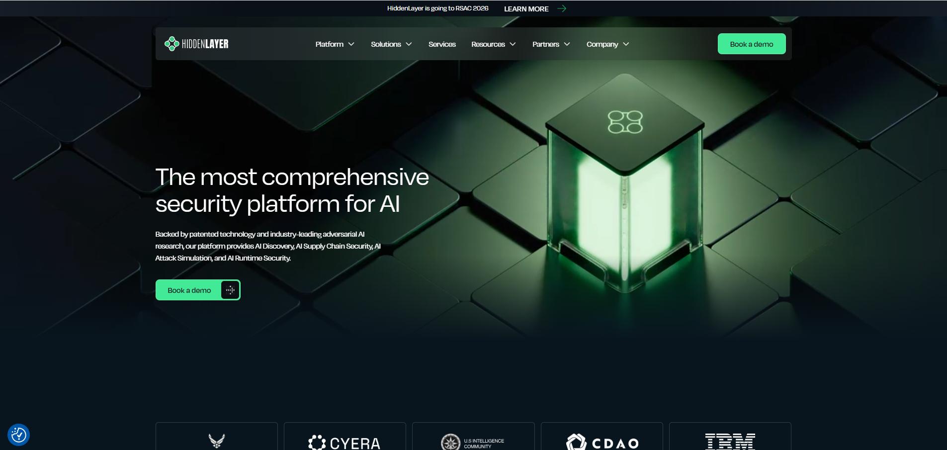 HiddenLayer homepage showing AI security platform with glowing cube visual, dark theme, and “Book a demo” CTA
