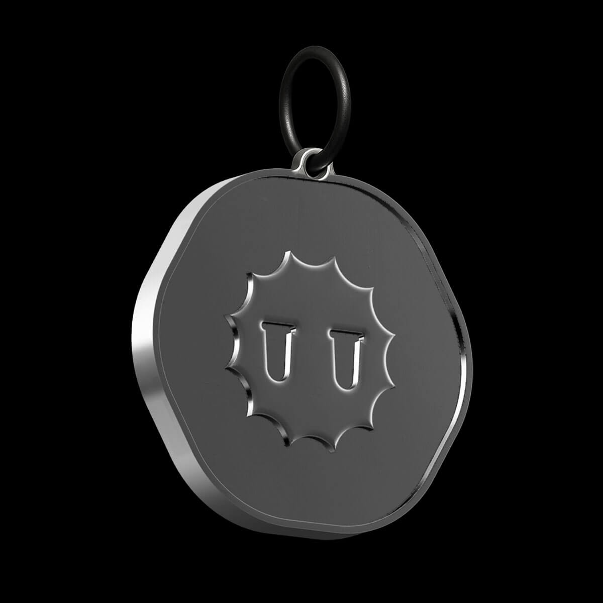 Fellowkids character keyring embossed into metal designed by Studio Kiln as part of their Fellowkids rebrand / brand identity.