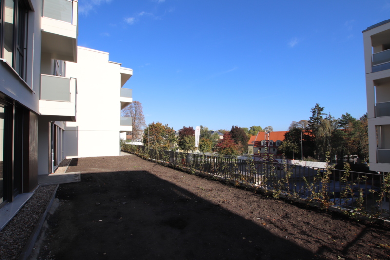 C1 Gartenseite der EG-Wohnungen mit Blick