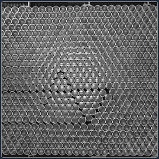 PalletPerfect Gate 01 accumulation table inspection — down cans and missing units detected before pattern formation