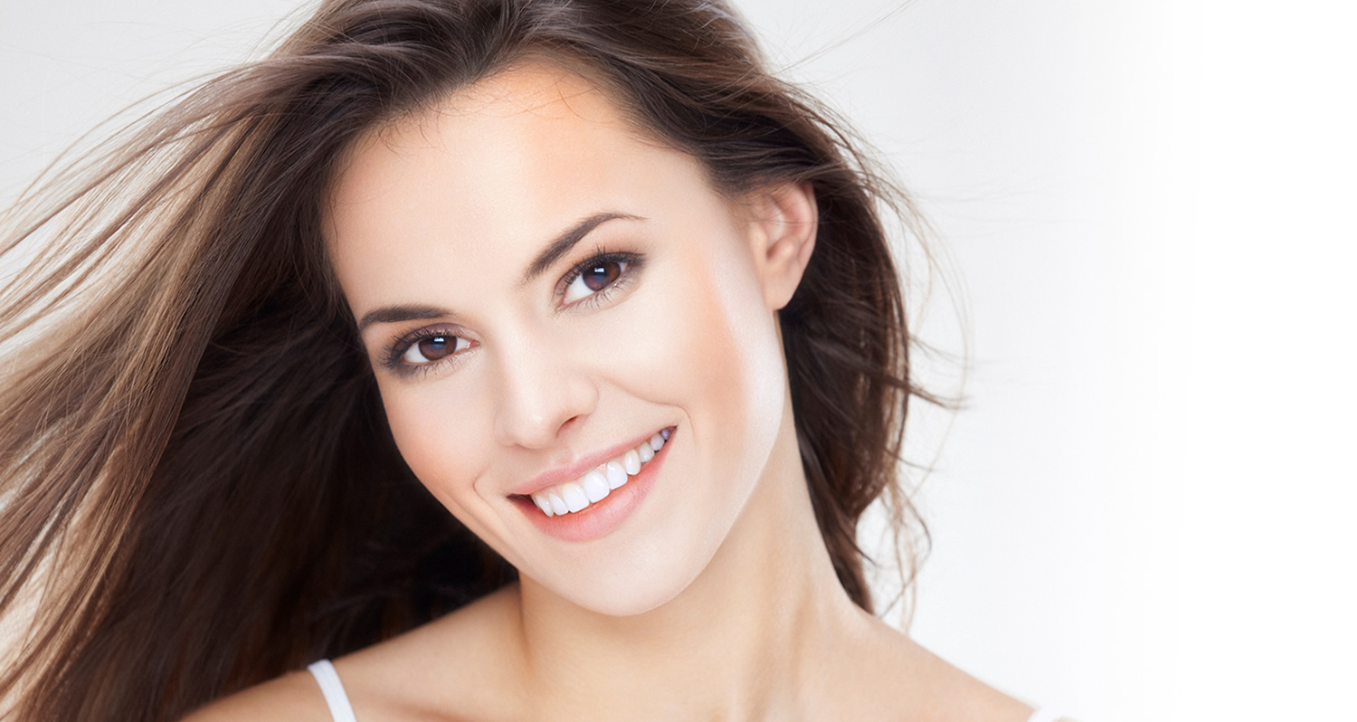 Smiling model from KöR Whitening’s official brand photography